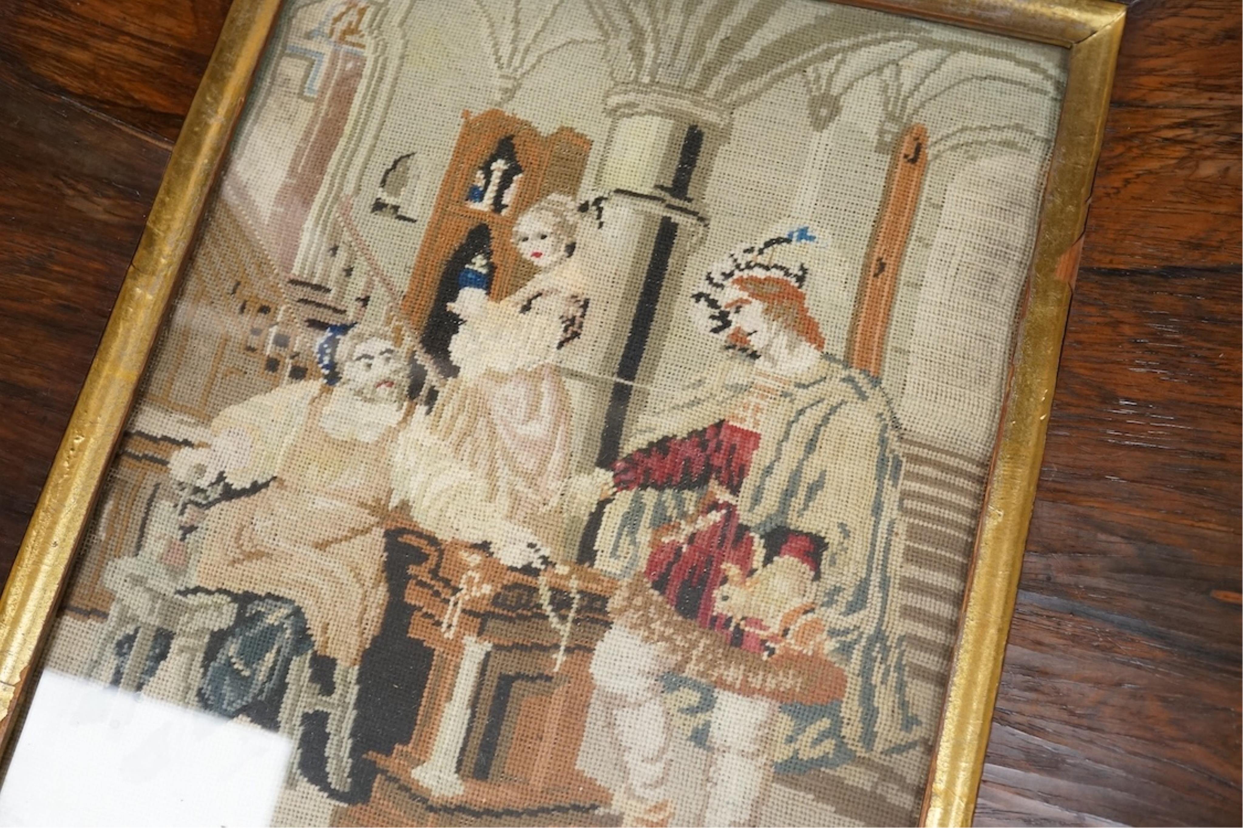 A rosewood framed 19th century Berlin wool worked figurative interior scene. 26cm x 20cm.